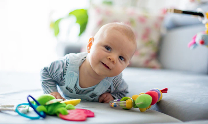 Baby Looking at Toy